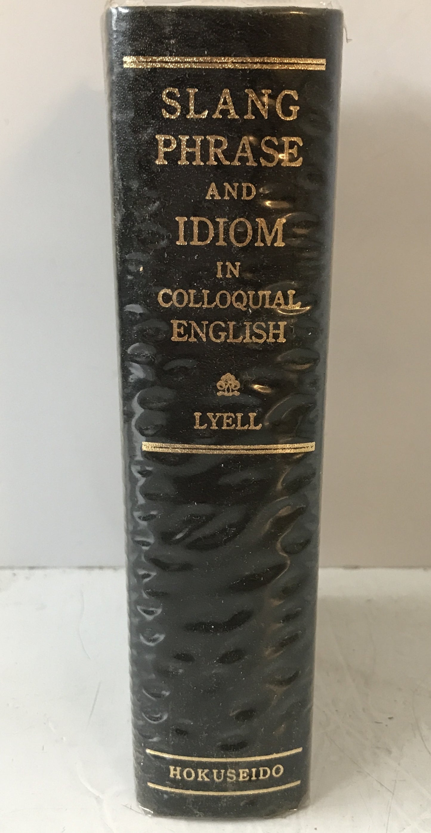 Slang, phrase, and idiom in colloquial English and their use = 最新英語日常語辞典
